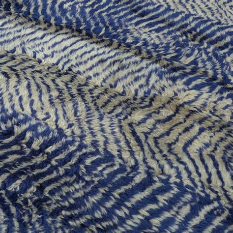 Moroccan rugs serve functional as well as decorative purposes and have become a staple item for office lobbies, living rooms, bedrooms and other such spaces. Blue and Gray Moroccan Berber Rug For Sale at 1stdibs