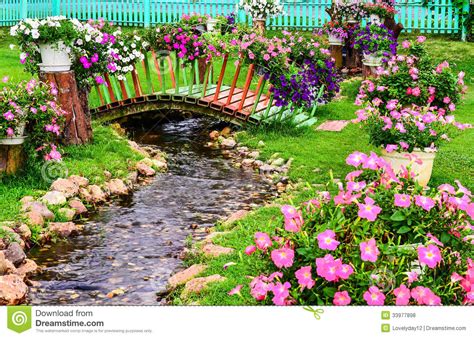 Spring Flowers In Garden With A Pond Royalty Free Stock Photos Image