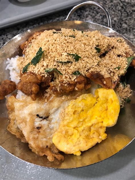 Each serving provides 702 kcal, 4g protein, 79g carbohydrates (of which 11g sugars), 24g fat (of which 5g saturates), 6g fibre and 3.5g salt. Salted Cereal Egg Chicken Rice by Supreet Kini