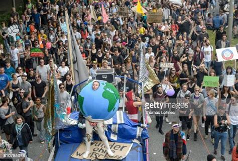 Protesters March During The G20 Summit Photos And Premium High Res