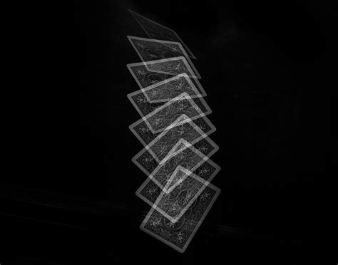 Long Exposure Stroboscopic Image Of A Playing Card Being Dropped