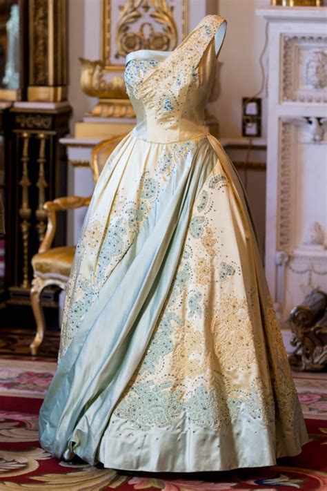 90 Years Of The Queens Fashion Goes On Display At Buckingham Palace