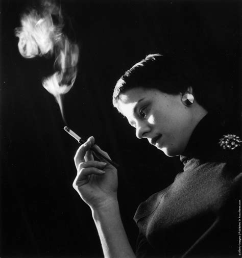 22 Vintage Photographs That Capture Women Smoking Cigarettes In The