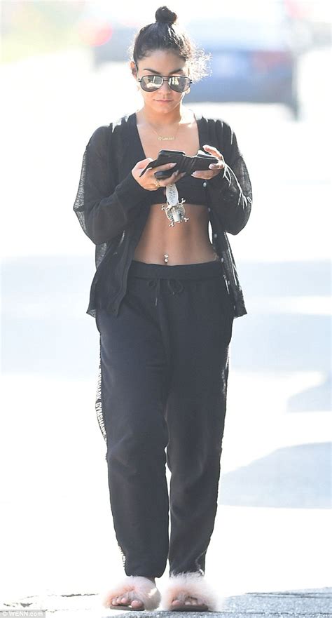 Vanessa Hudgens Flashes Her Toned Tummy In A Black Bra And Sweatpants