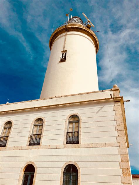 Free Images Lighthouse Blue Tower Sky Landmark Architecture