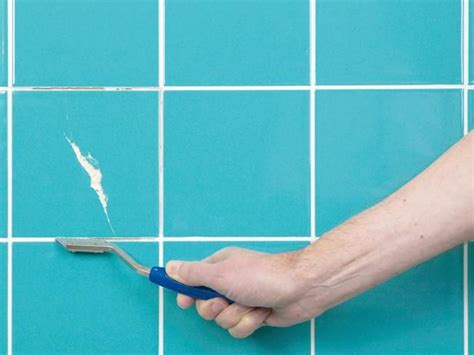 Regrouting your tile is a simple task that can be done in a small amount of time. How to Repair Cracked Tiles | Regrouting tile, Wall tiles ...