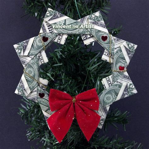 Giochi di carta did a bit of origami magic with their paper ornaments. DOLLAR ORIGAMI WREATH - Beautiful Christmas Tree Ornament ...