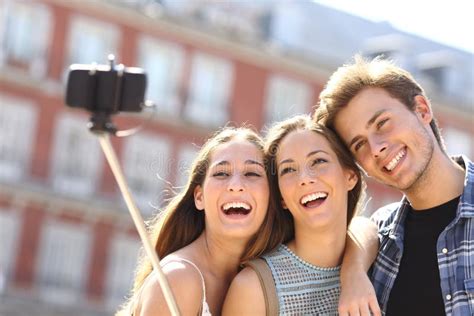 Group Of Tourist Friends Taking Selfie With Smart Phone Stock Image