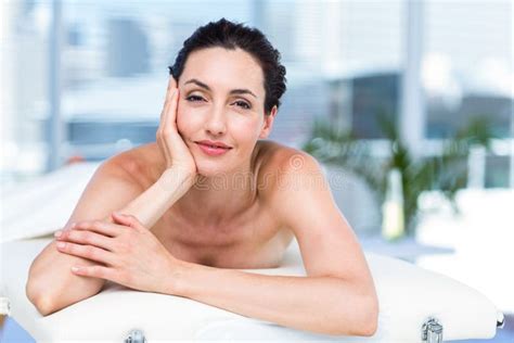 smiling brunette relaxing on massage table stock image image of leisure healthy 53072453