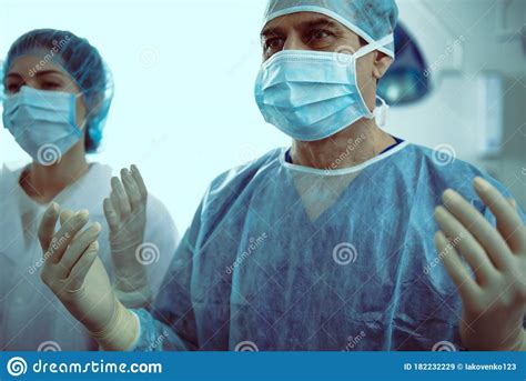 Doctor And Nurse In Surgical Uniform In Hospital Stock Image Image Of