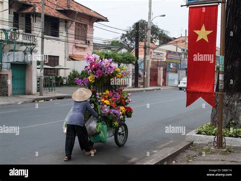 An Unidentified Woman Sells Flowers On January In Ho Chi Minh
