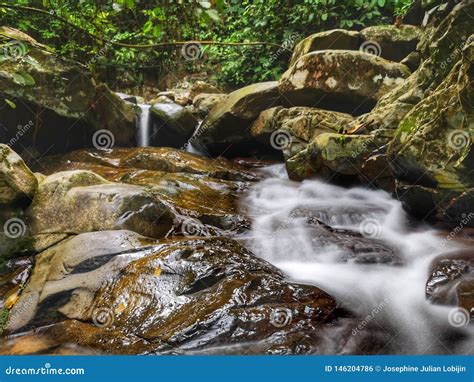 Beautiful Silky Smooth Waterfall Stream In The Rainforest Sabah