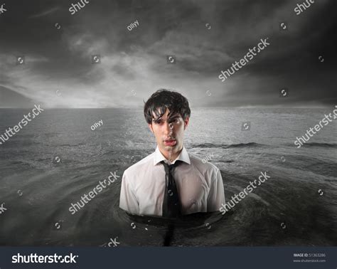 Wet Businessman Standing In The Water Stock Photo 51363286 Shutterstock