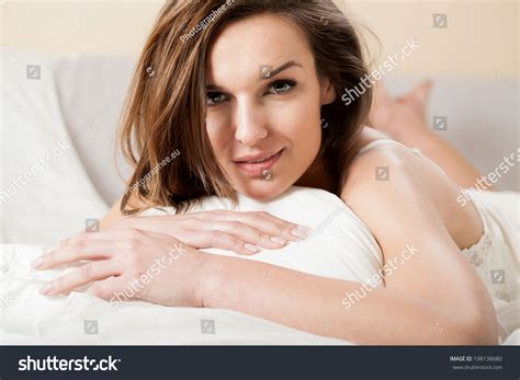 beautiful sexy woman lying bed smiling 스톡 사진 198138680 shutterstock