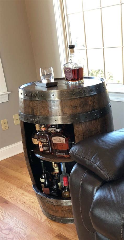 whiskey barrel liquor cabinet handcrafted from a reclaimed etsy whiskey barrel liquor