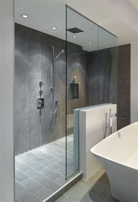 Large Walk In Doorless Shower With Gray Slate Tiles And A Floating Glass Wall Cr 1000 In