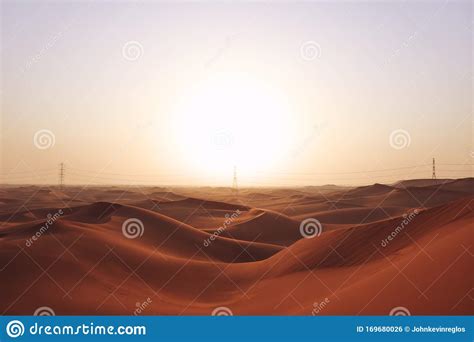 Sunrise In The Red Desert Sand Dunes Of The Arabian Desert Stock Photo