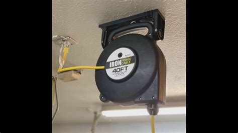 Indoor, slimline 8 ft extension cord with a right angled plug will not block the other outlets allowing you to still use. How to Install a Retractable Extension Cord in Your Garage ...