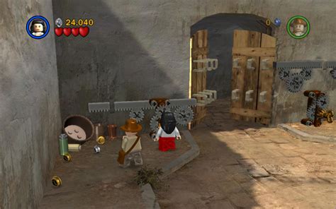 In the back left is an obvious gold stud marking an entrance. Raiders of the Lost Ark Level 3: City of Danger - LEGO ...