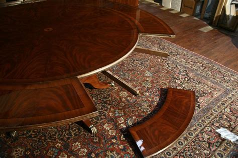 A dining room table is an important part of your home. Perimeter Table | Round Dining Table with Perimeter Leaves ...