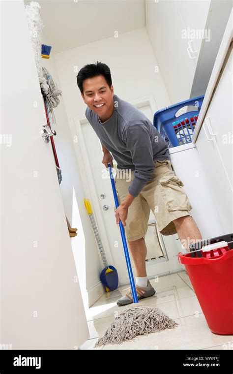 Man Mopping Floor Stock Photo Alamy