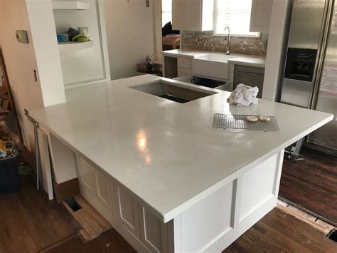 Oct 20, 2020 · but where plain concrete's gray color would draw attention to a drainage ditch or path, colored concrete can be used to help those features blend with the other landscape elements. Functional, Stylish White Kitchen Countertops! | White ...