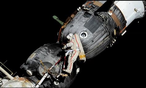 russian cosmonauts spacewalk to a strange “mystery hole” aboard soyuz spacecraft