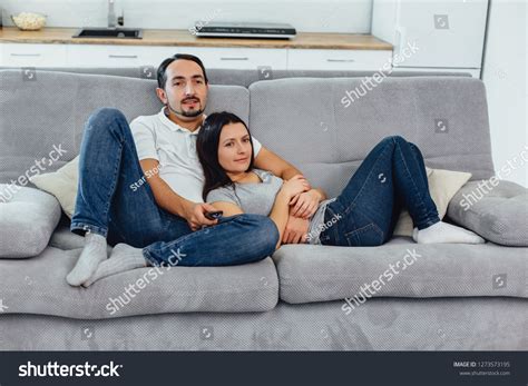 Husband Wife Sitting On Sofa Watching Stock Photo Shutterstock