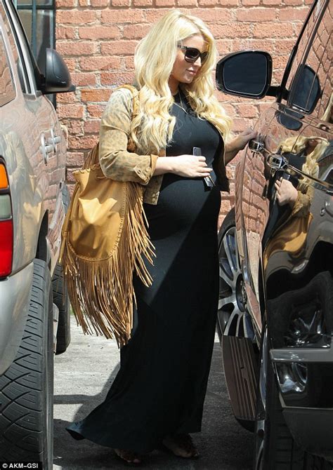 Jessica Simpson Shows Off Her Large Bump In Floorlength Dress As She