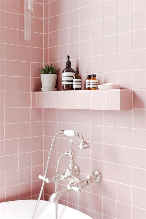 Blushing pink bathroom ideas including pink bathroom accessories; Tour 2LG's Pink Bathroom - Pink Bathroom Tiles