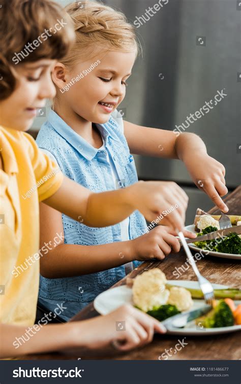 Cropped Shot Cute Smiling Children Eating Stock Photo 1181486677