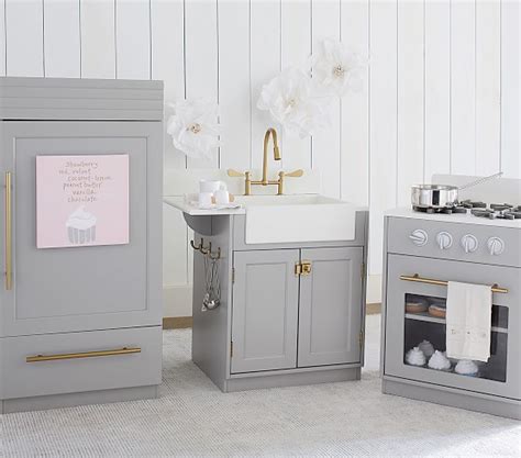 Turned wood legs and ball finials give it elegance and charm. Pottery Barn Kids Play Kitchen Sale: 20% Off Retro ...