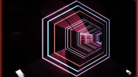 Flight Of The Camera Through A Multi Colored Tunnel Of Neon Polygons