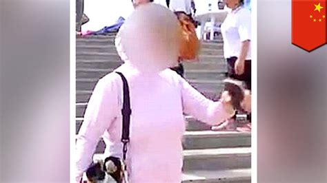 Chinese Woman Goes Crazy Over Beach Pebble Souvenir Tomonews Youtube