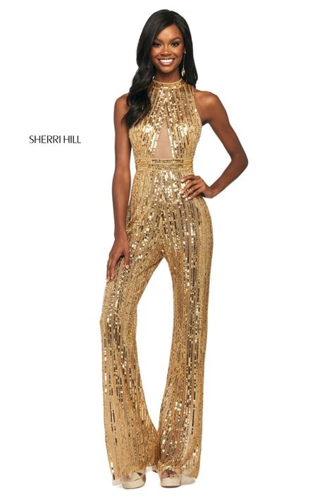 This Sherri Hill 53729 Gold Sleeveless Prom Jumpsuit Is Crafted In Sequin Mesh Detailed With