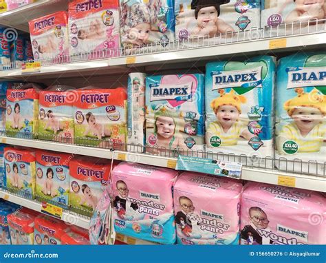 Variety Brand Of Diapers Displayed On The Rack For Sale In Large