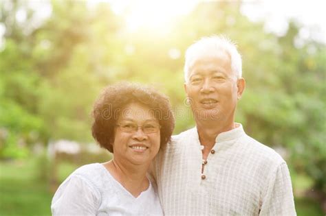 Happy Old Asian Couple Smiling Stock Image Image Of Nature Looking