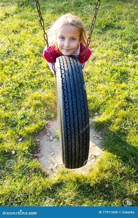 Girl On Tire Swing Stock Photo Image Of Entertainment 77911656