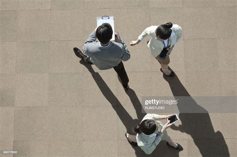 Top View Of Business People Walking High Res Stock Photo Getty Images