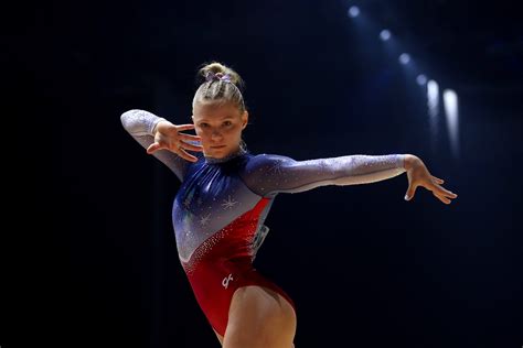 U S Womens Gymnastics Team Wins Gold At World Championships Qualifies For Olympics The