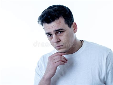 Portrait Of Sad And Desperate Handsome Man Feeling Depressed In Facial