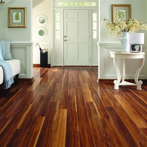 Premium permamax® wear layer with scratchguard advanced surface protection provides twice the wear resistance and superior scratch and scuff protection. Visconti Walnut Laminate Flooring at Lowes.com | Walnut ...