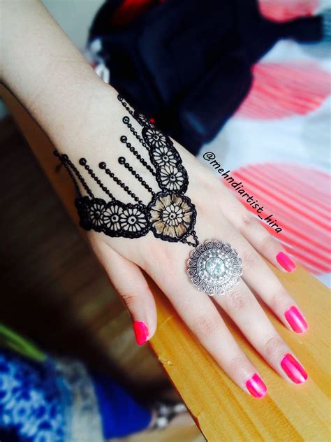 The hands are filled with intricate designs and patterns. Pin by sweetkittytoy on mehndi | Mehndi designs for girls ...