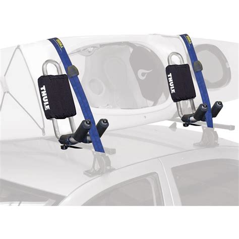 With the roof now supporting the weight of the kayak, walk to the stern. Thule Hull-A-Port Kayak Roof Rack | Peter Glenn