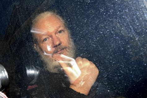 WikiLeaks founder Julian Assange arrested at Ecuadorian Embassy in