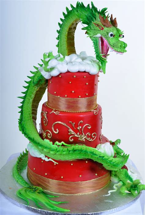 The cake is often decorated with birthday wishes (happy birthday) and the celebrant's name. W799 - Dragon In The Clouds | Happy birthday cakes, Fantasy cake, Dragon cakes