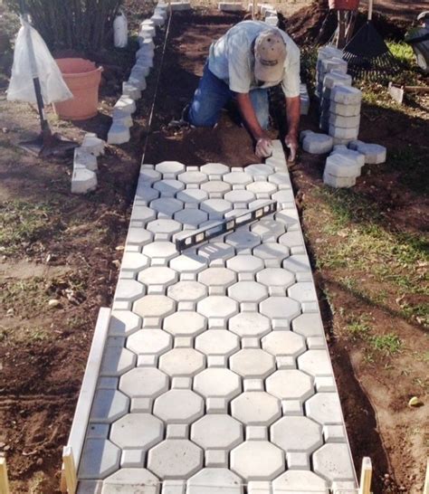 Easy to use, fill the mould with mixed cement, leave for 5 minutes and remove mould. 24 PAVER MOLDS MAKE DIY INTERLOCKING KEYHOLE DRIVEWAY PAVERS +6 EDGE MOLDS FREE! - Stepping Stones