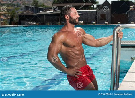Muscular Man Resting In Swimming Pool Stock Photo Image Of Abdominal