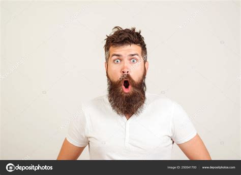 Shocked Bearded Man Stares At Camera Bearded Hipster Guy Widely Opened Mouth And Eyes — Stock