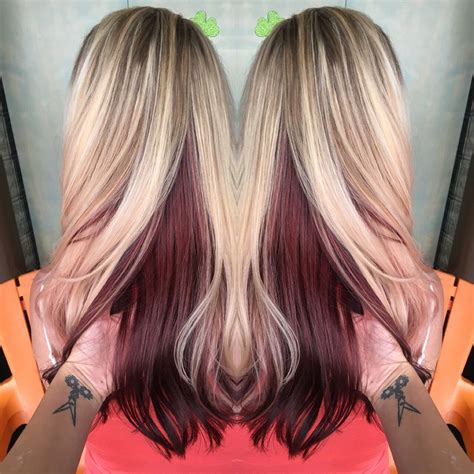 As far as choosing the best hair someone with red undertones is better suited to cooler hair shades—violet reds, cool icy blondes, and mocha browns. Blonde with violet red underneath | Hair color underneath ...